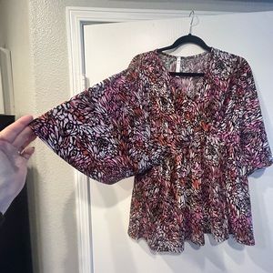 dear Scarlett flutter by top. Silly polyester spandex. Sz M Like new condition.